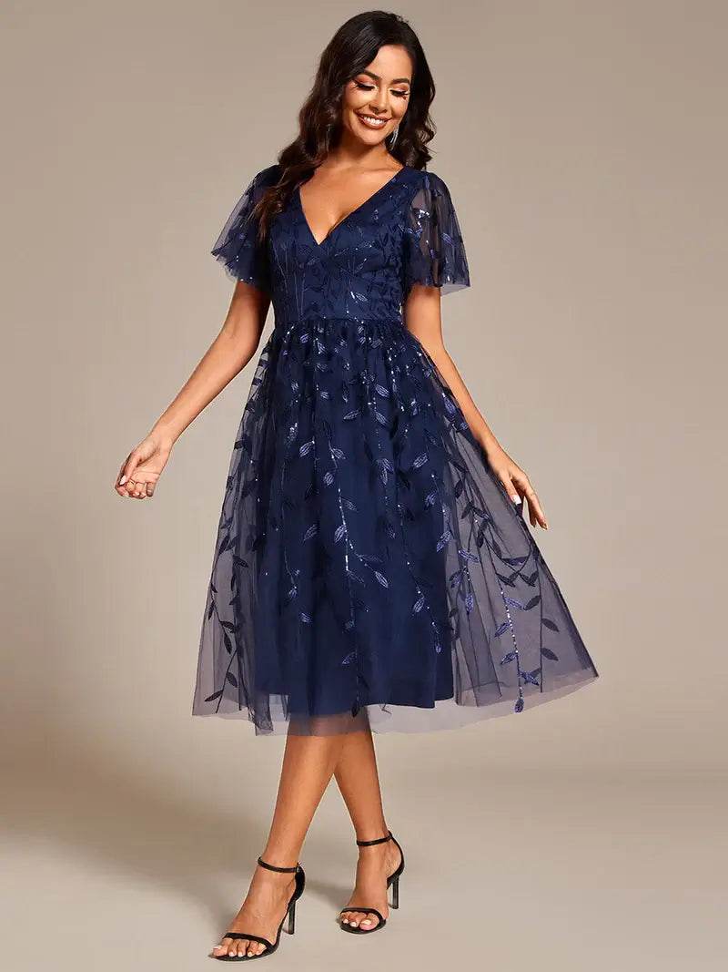 Exquisite Midi-Length Tulle Dress with Ruffled Sleeves, Sequins & Embroidery - Biamonde